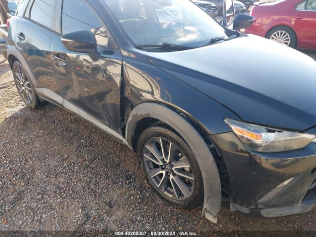 JM1DKFC72J0309204 Mazda Cx-3 Touring