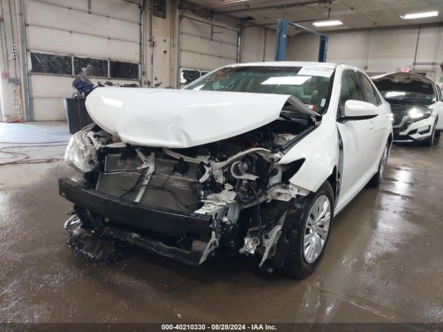 4T1BD1FK1EU107534 Toyota Camry Hybrid Le
