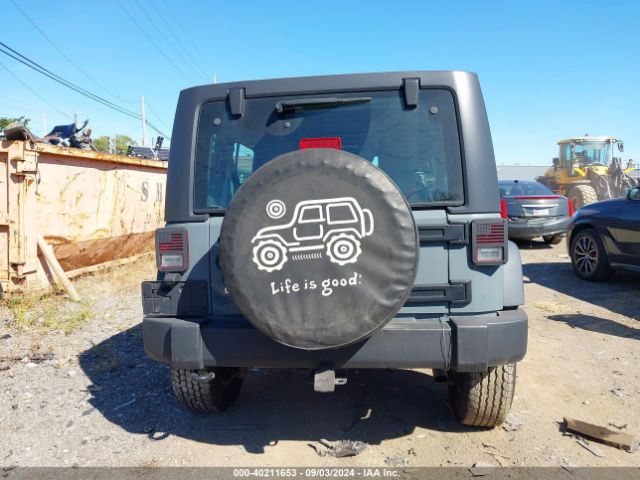 1C4BJWDG8FL712490 Jeep Wrangler Unlimited Sport