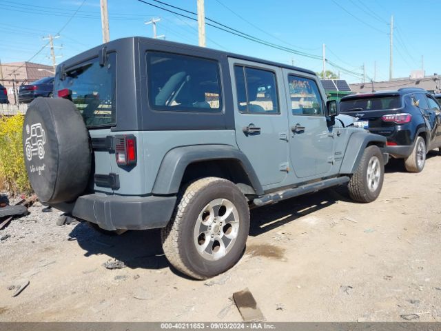 1C4BJWDG8FL712490 Jeep Wrangler Unlimited Sport