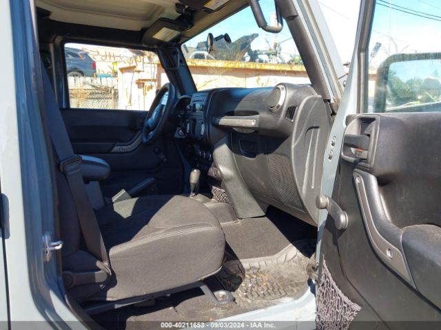 1C4BJWDG8FL712490 Jeep Wrangler Unlimited Sport