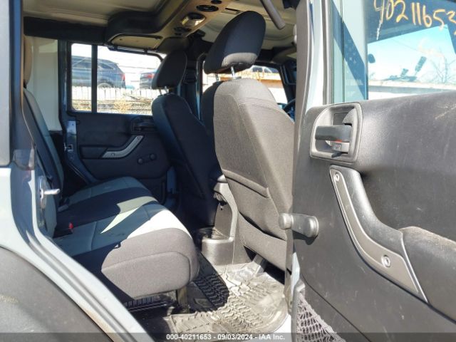 1C4BJWDG8FL712490 Jeep Wrangler Unlimited Sport