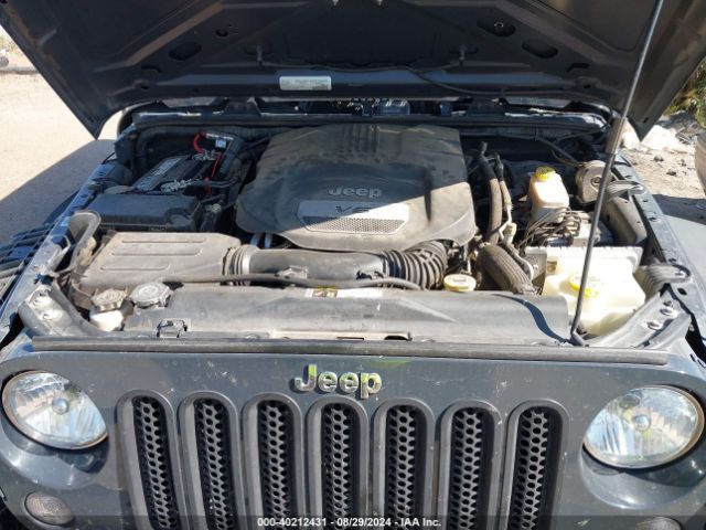 1C4BJWDG8GL270554 Jeep Wrangler Unlimited Sport