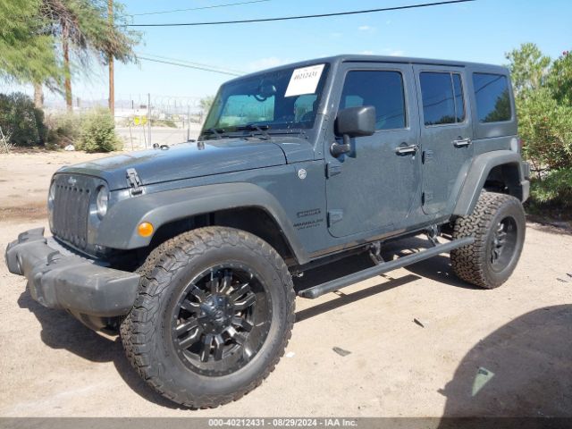 1C4BJWDG8GL270554 Jeep Wrangler Unlimited Sport
