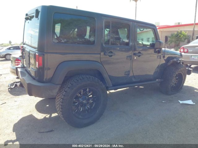 1C4BJWDG8GL270554 Jeep Wrangler Unlimited Sport