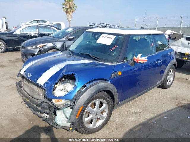 2009 MINI COOPER WMWMF33599TW70342 Photo 1