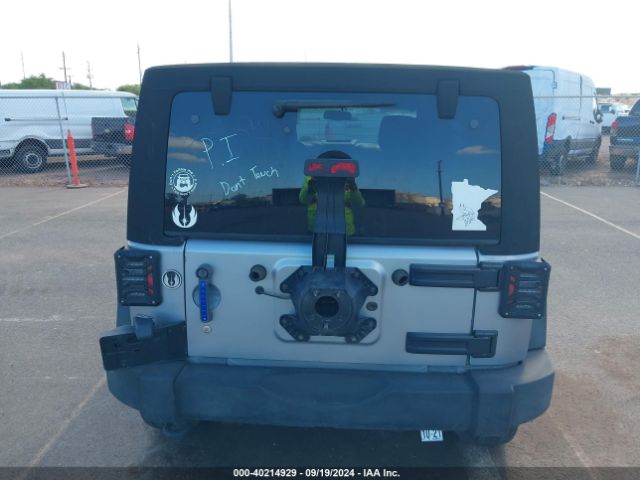 1C4HJWDG0EL227706 Jeep Wrangler Unlimited Sport