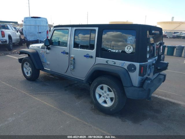 1C4HJWDG0EL227706 Jeep Wrangler Unlimited Sport