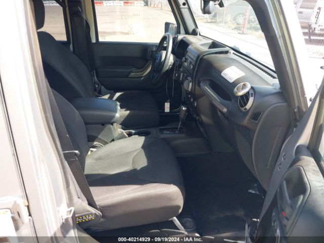 1C4HJWDG0EL227706 Jeep Wrangler Unlimited Sport