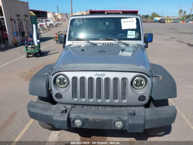 1C4HJWDG0EL227706 Jeep Wrangler Unlimited Sport