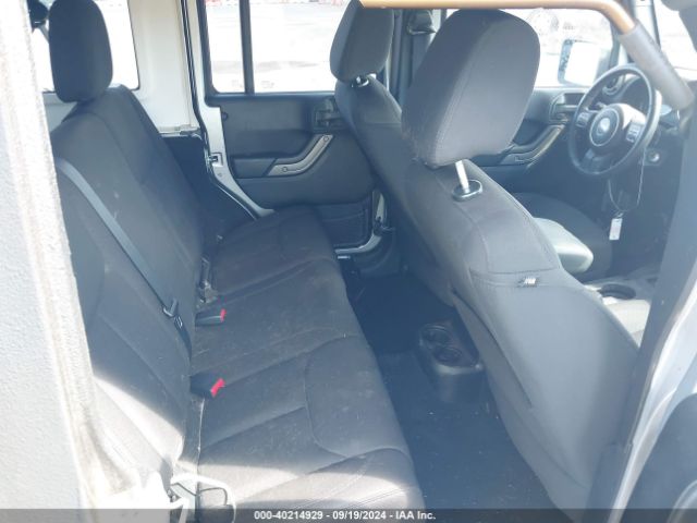 1C4HJWDG0EL227706 Jeep Wrangler Unlimited Sport