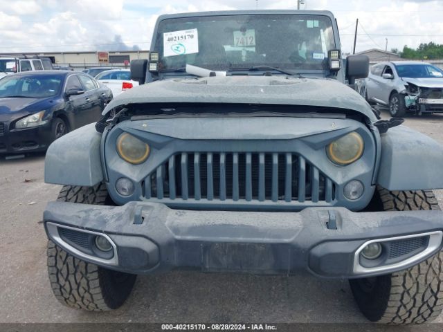 1C4BJWDG0EL247251 Jeep Wrangler Unlimited Sport
