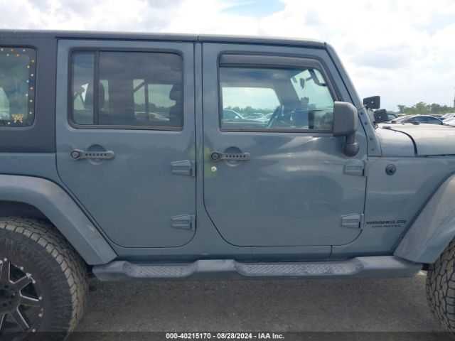 1C4BJWDG0EL247251 Jeep Wrangler Unlimited Sport