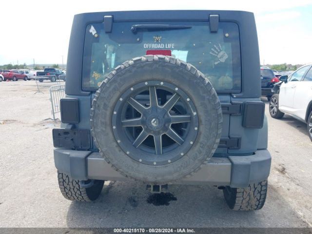 1C4BJWDG0EL247251 Jeep Wrangler Unlimited Sport