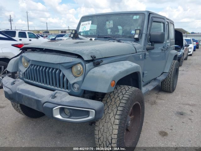 1C4BJWDG0EL247251 Jeep Wrangler Unlimited Sport