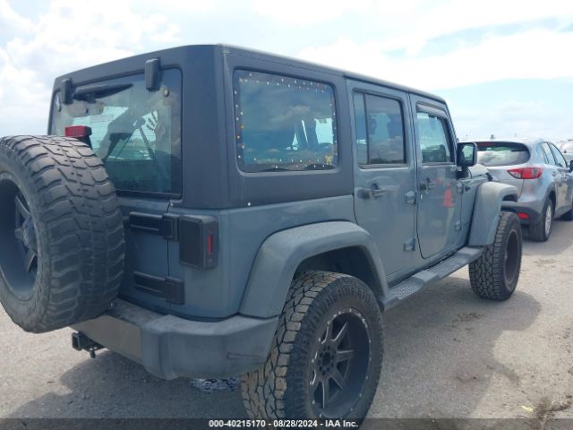 1C4BJWDG0EL247251 Jeep Wrangler Unlimited Sport