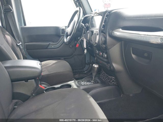 1C4BJWDG0EL247251 Jeep Wrangler Unlimited Sport