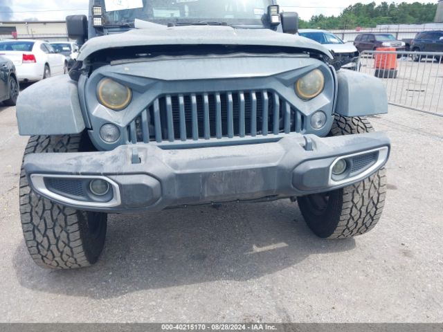 1C4BJWDG0EL247251 Jeep Wrangler Unlimited Sport
