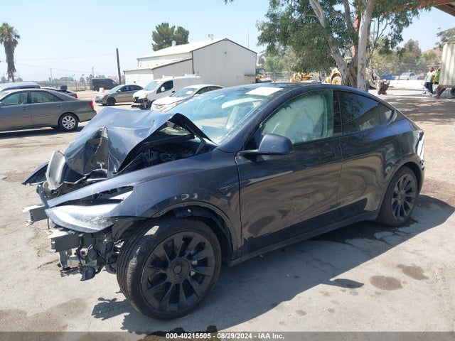 2024 TESLA MODEL Y 7SAYGAEE8RF030230 Photo 1