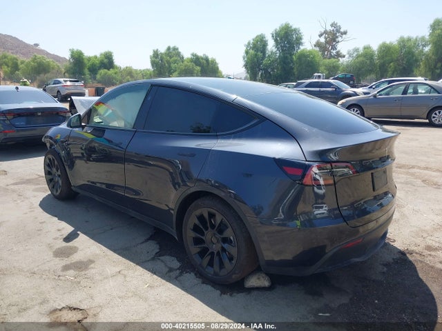 2024 TESLA MODEL Y 7SAYGAEE8RF030230 Photo 2