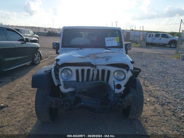 1C4BJWDG8FL694007 Jeep Wrangler Unlimited Sport
