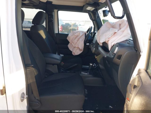 1C4BJWDG8FL694007 Jeep Wrangler Unlimited Sport