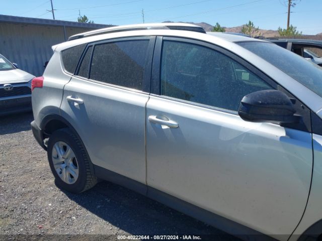 JTMZFREV8EJ012557 Toyota RAV4 LE