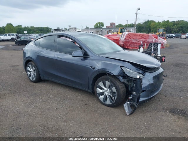 2023 TESLA MODEL Y 7SAYGDEE8PF804409 Photo 0