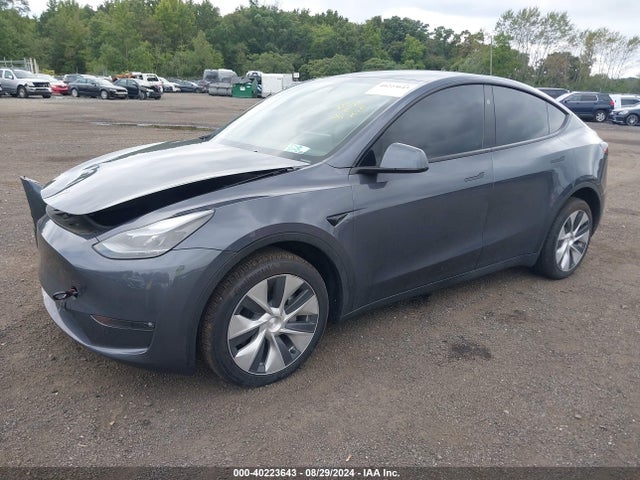 2023 TESLA MODEL Y 7SAYGDEE8PF804409 Photo 1