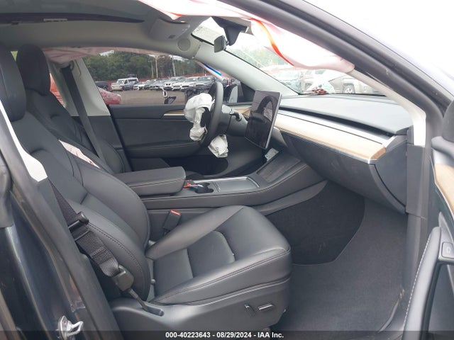 2023 TESLA MODEL Y 7SAYGDEE8PF804409 Photo 4