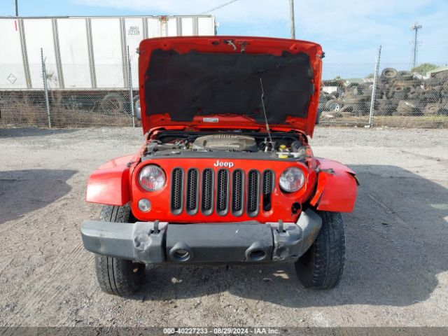1C4BJWEG9FL708155 Jeep Wrangler Unlimited Sahara