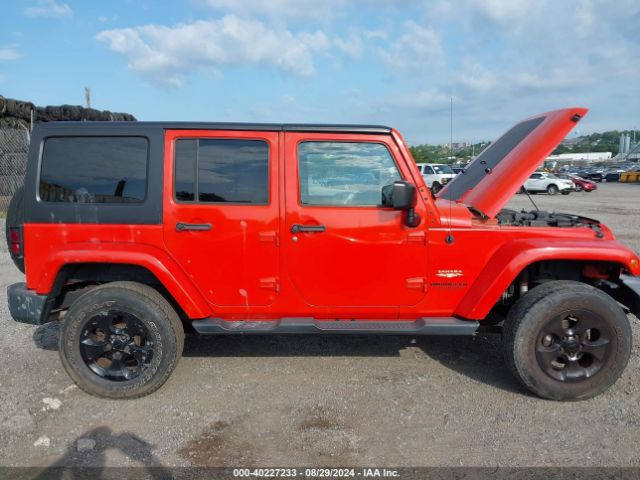 1C4BJWEG9FL708155 Jeep Wrangler Unlimited Sahara