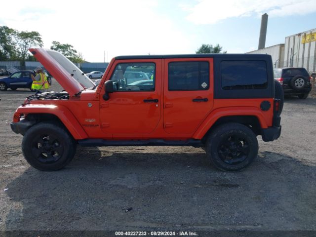 1C4BJWEG9FL708155 Jeep Wrangler Unlimited Sahara