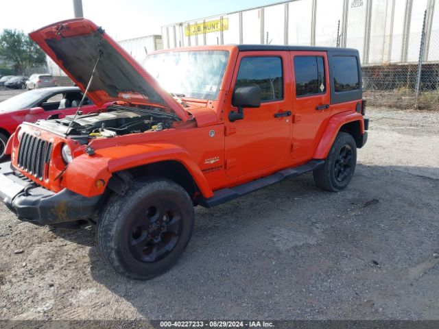 1C4BJWEG9FL708155 Jeep Wrangler Unlimited Sahara