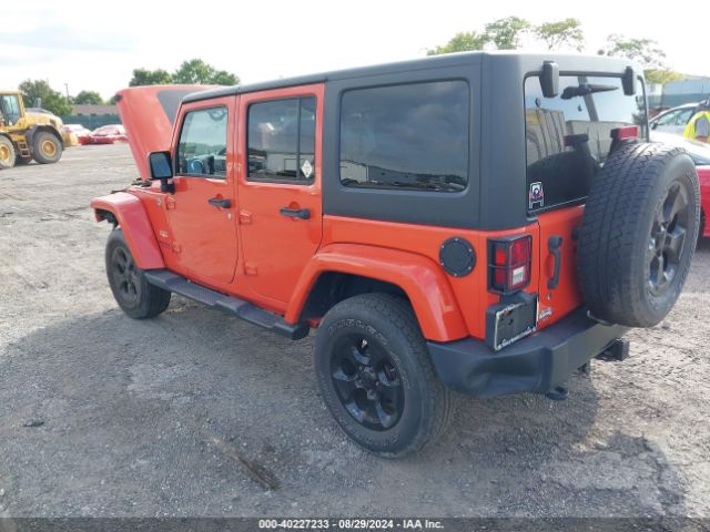 1C4BJWEG9FL708155 Jeep Wrangler Unlimited Sahara