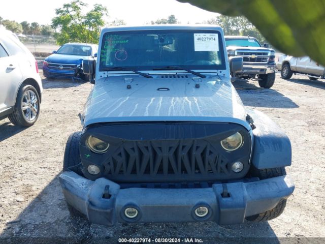 1C4BJWDG9GL107153 Jeep Wrangler Unlimited Sport