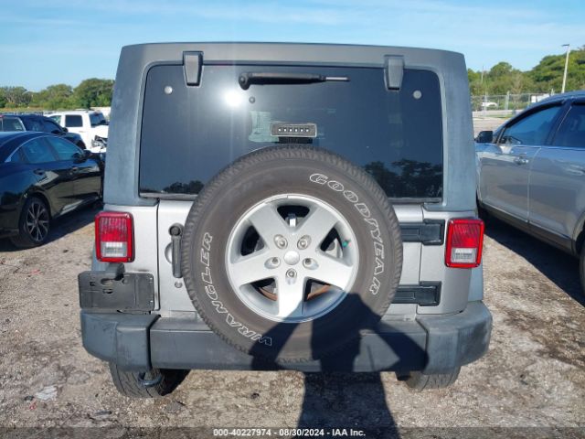 1C4BJWDG9GL107153 Jeep Wrangler Unlimited Sport