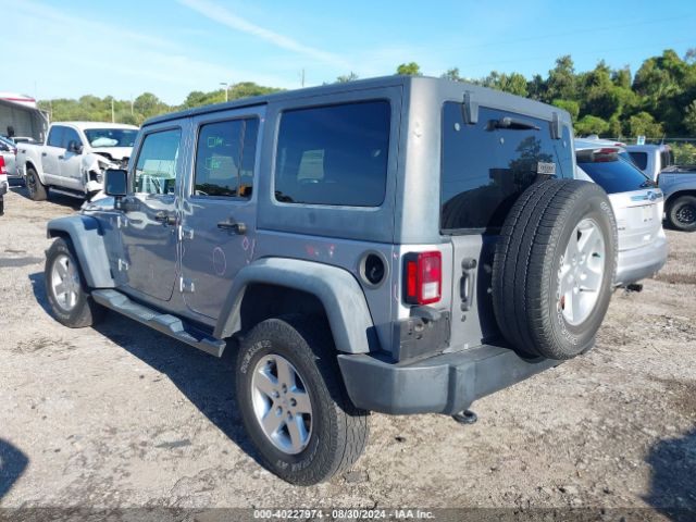 1C4BJWDG9GL107153 Jeep Wrangler Unlimited Sport