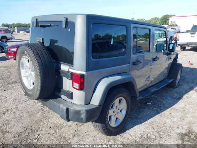 1C4BJWDG9GL107153 Jeep Wrangler Unlimited Sport
