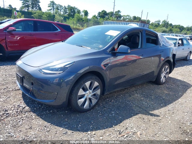 2023 TESLA MODEL Y 7SAYGDEE1PF892686 Photo 1