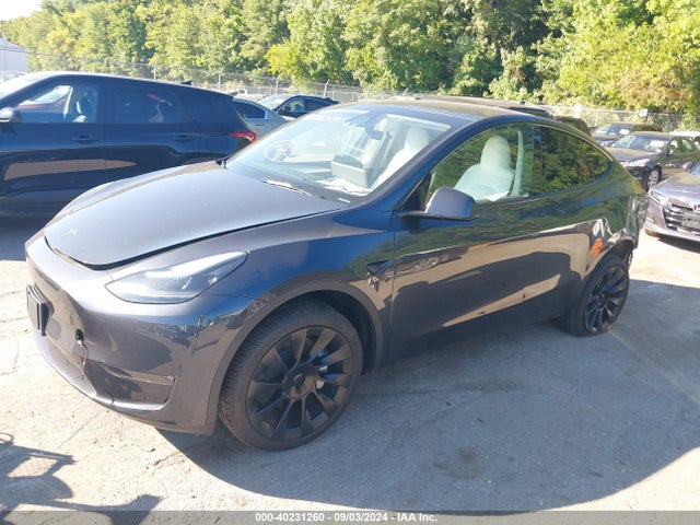 2024 TESLA MODEL Y 7SAYGDEE1RA221888 Photo 1