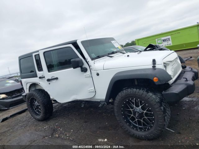 1C4BJWDG8GL170132 Jeep Wrangler Unlimited Sport