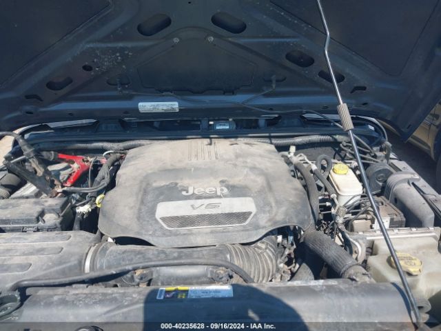 1C4BJWDG3GL338002 Jeep Wrangler Unlimited Sport