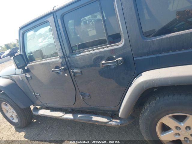 1C4BJWDG3GL338002 Jeep Wrangler Unlimited Sport