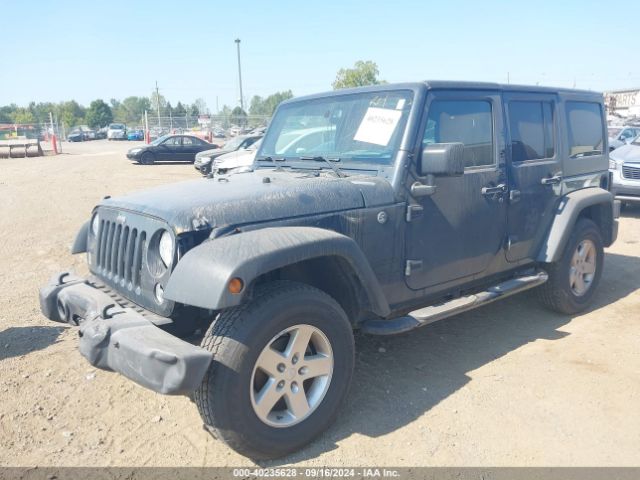 1C4BJWDG3GL338002 Jeep Wrangler Unlimited Sport