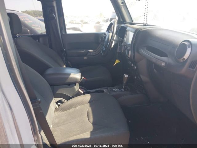 1C4BJWDG3GL338002 Jeep Wrangler Unlimited Sport