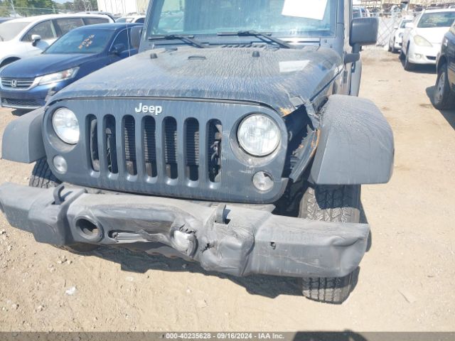 1C4BJWDG3GL338002 Jeep Wrangler Unlimited Sport