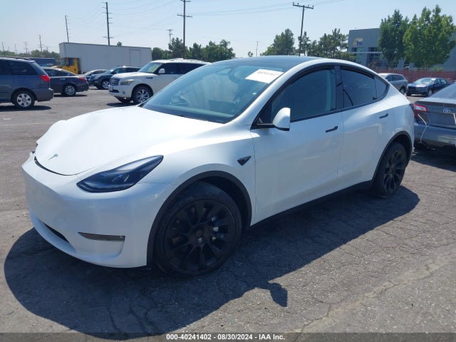 2023 TESLA MODEL Y 7SAYGDEEXPF801284 Photo 1