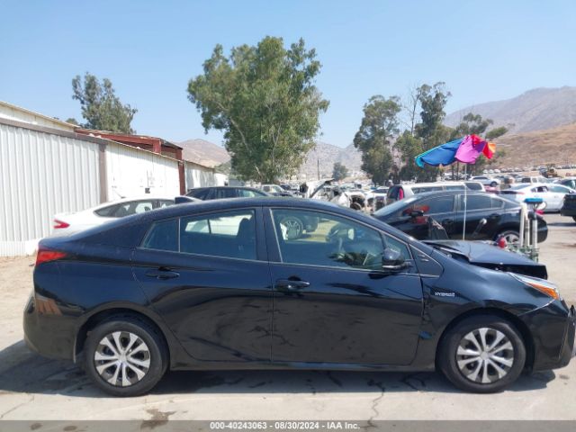 JTDKAMFUXM3138303 Toyota Prius Le
