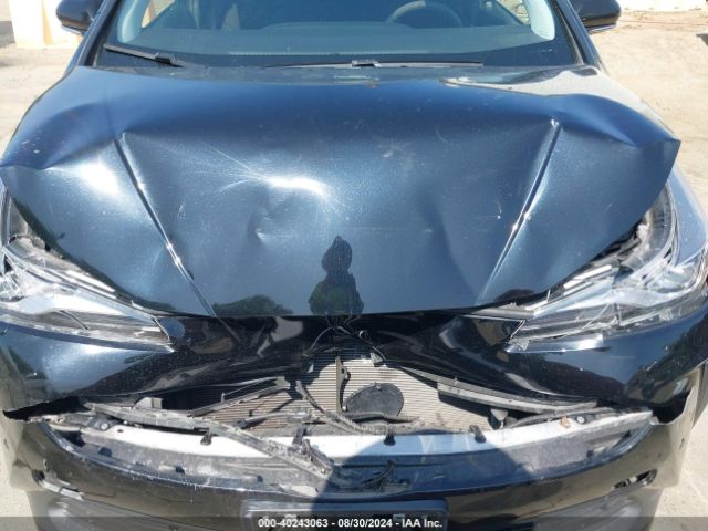 JTDKAMFUXM3138303 Toyota Prius Le